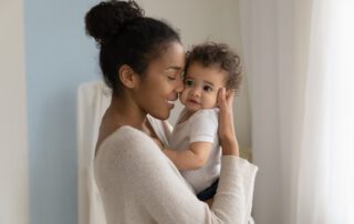 Black pro life mother with baby