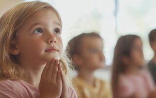 young girl praying