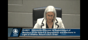 Board of Commissioners member discussing vote on BRE members