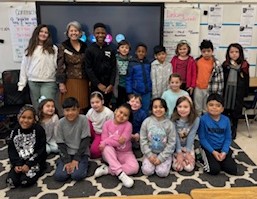 Charlice Byrd with children in the community