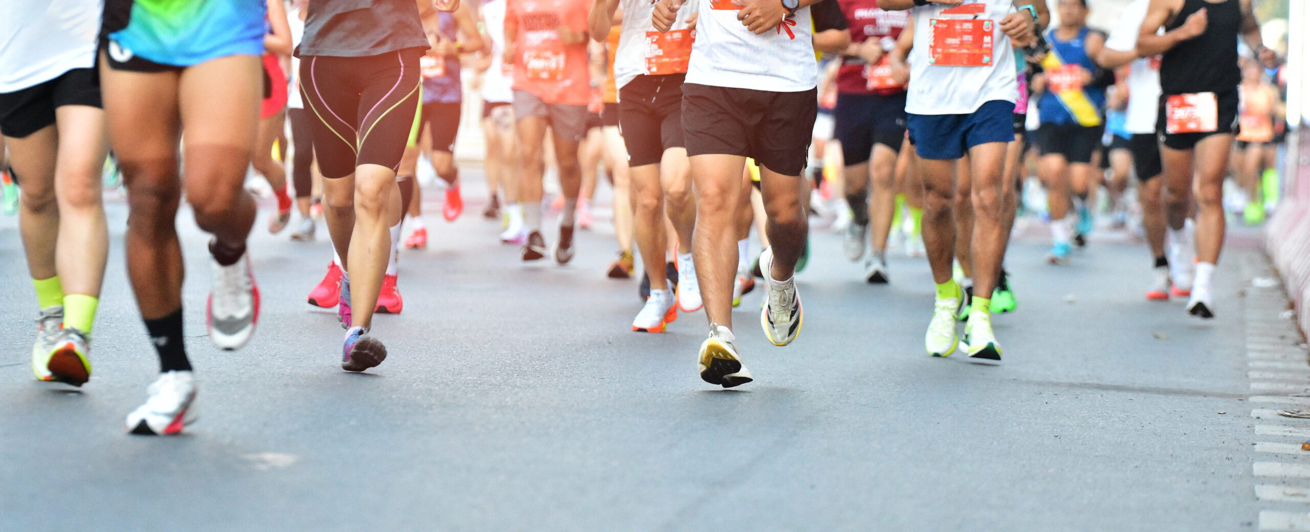 runners in road race, to represent the Peachtree Road Race