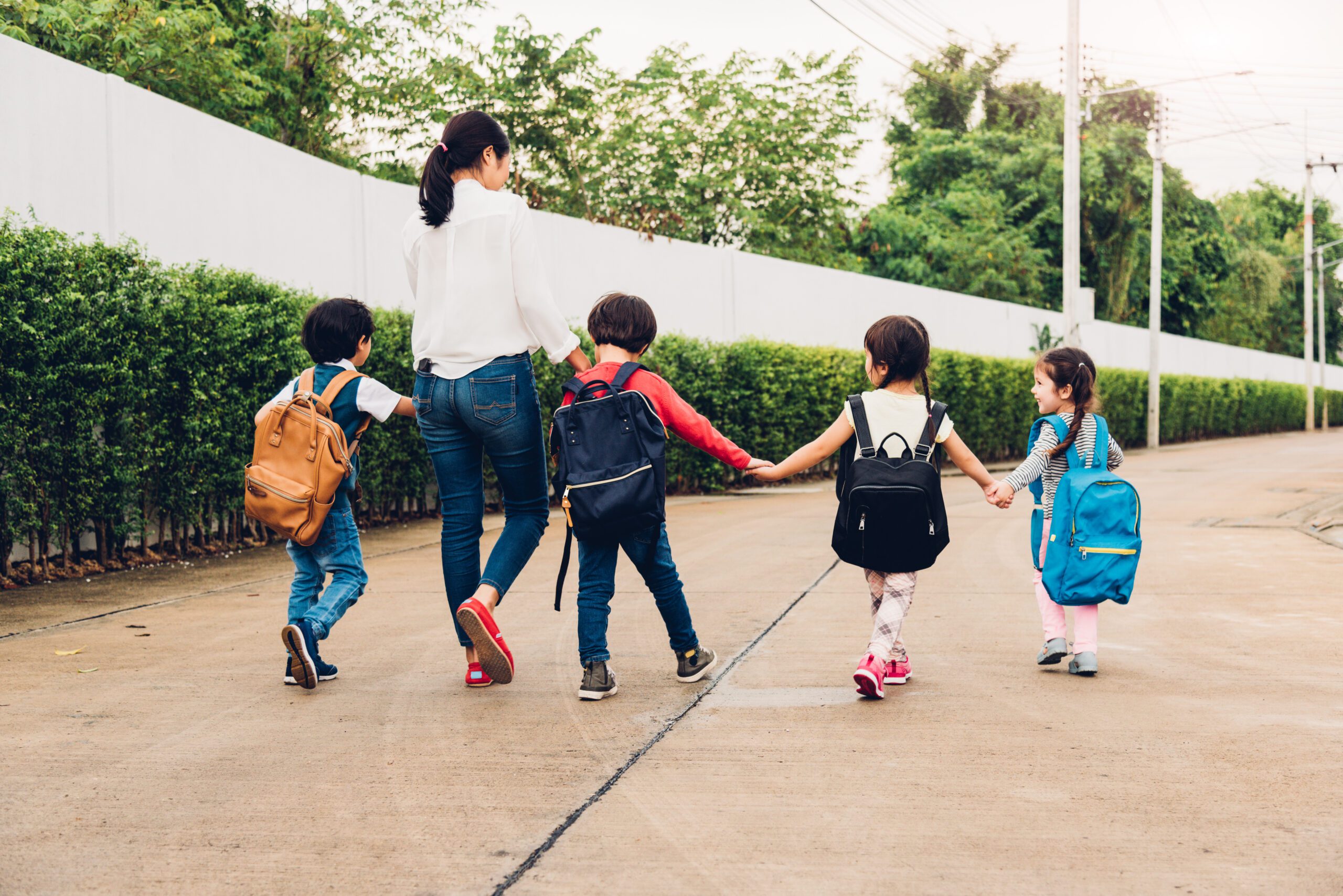mother practicing parental rights - taking children to school